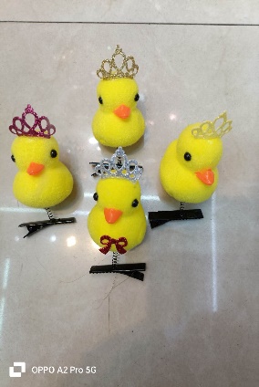 Broche de patitos princesa