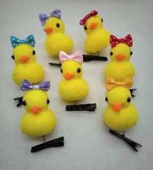 Broche de patitos con moño
