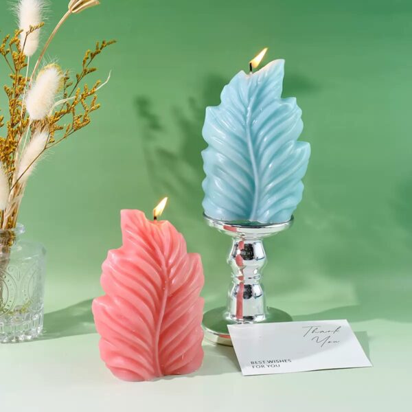 Vela en forma de Pluma